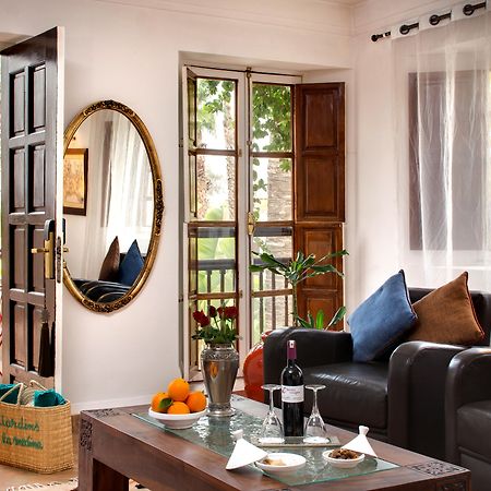 Les Jardins De La Medina Hotel Marrakesh Exterior foto A living room in a typical apartment