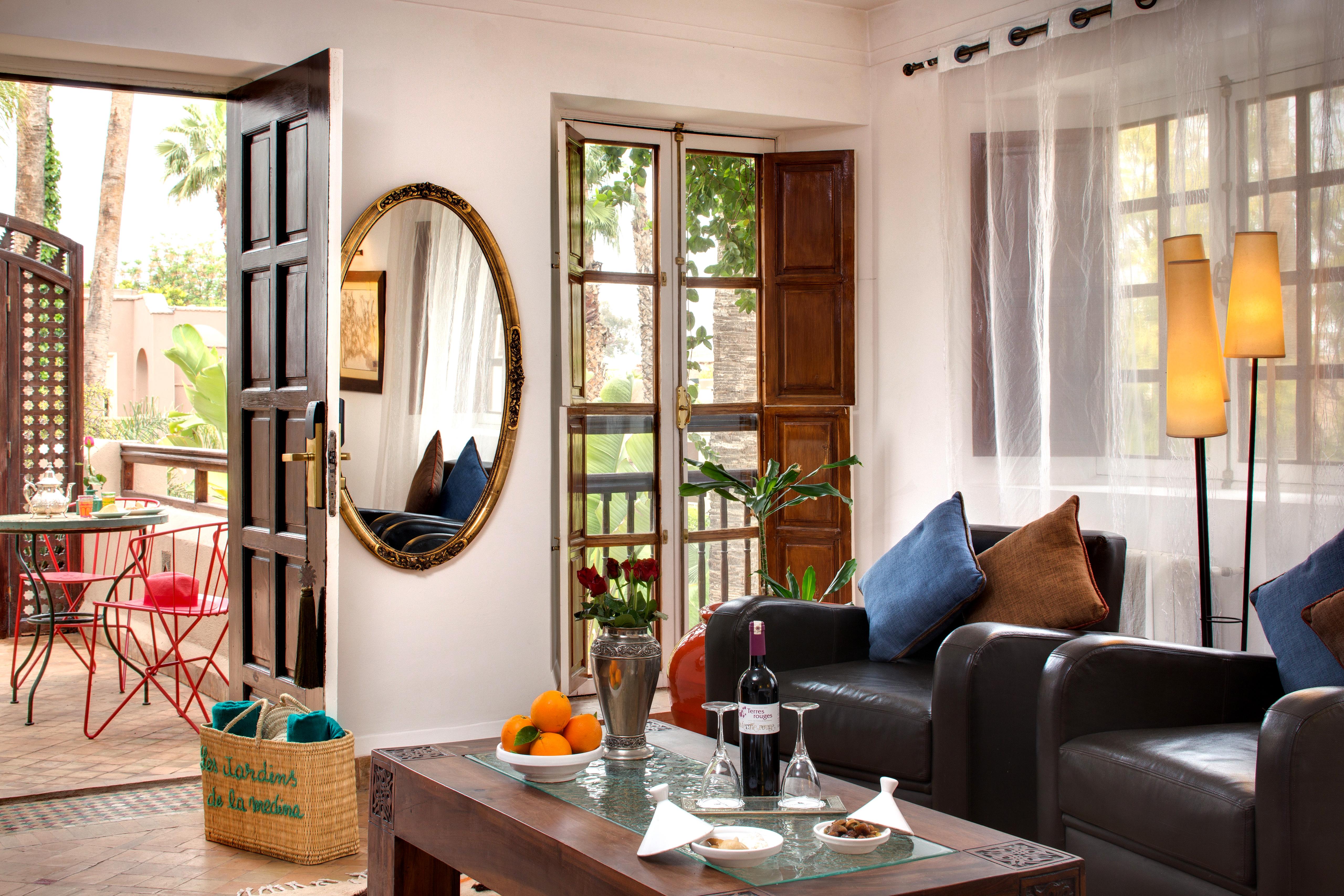 Les Jardins De La Medina Hotel Marrakesh Exterior foto A living room in a typical apartment