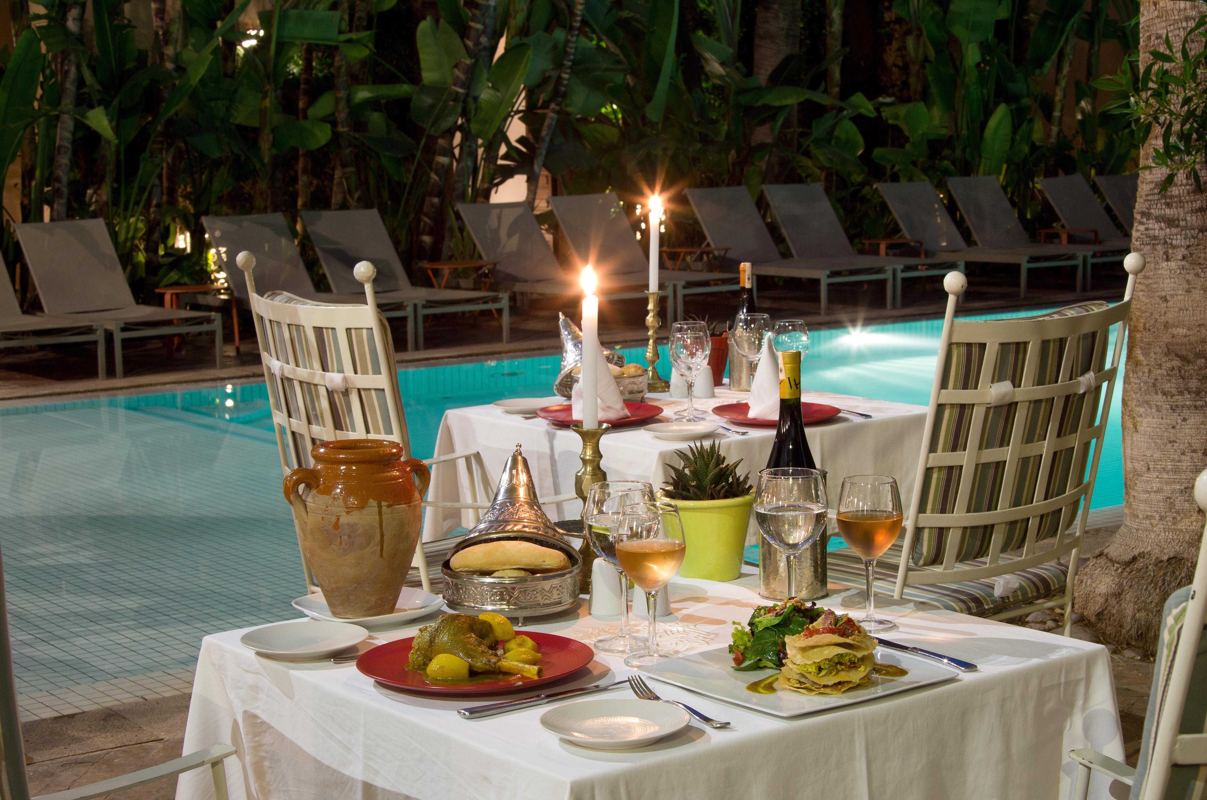 Les Jardins De La Medina Hotel Marrakesh Exterior foto A table set for a meal